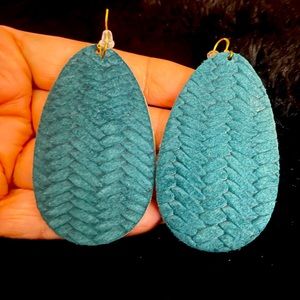 Genuine Suede teal green medium earrings with chevron like braiding. $15